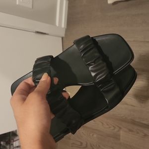 Never worn Black flat sandals